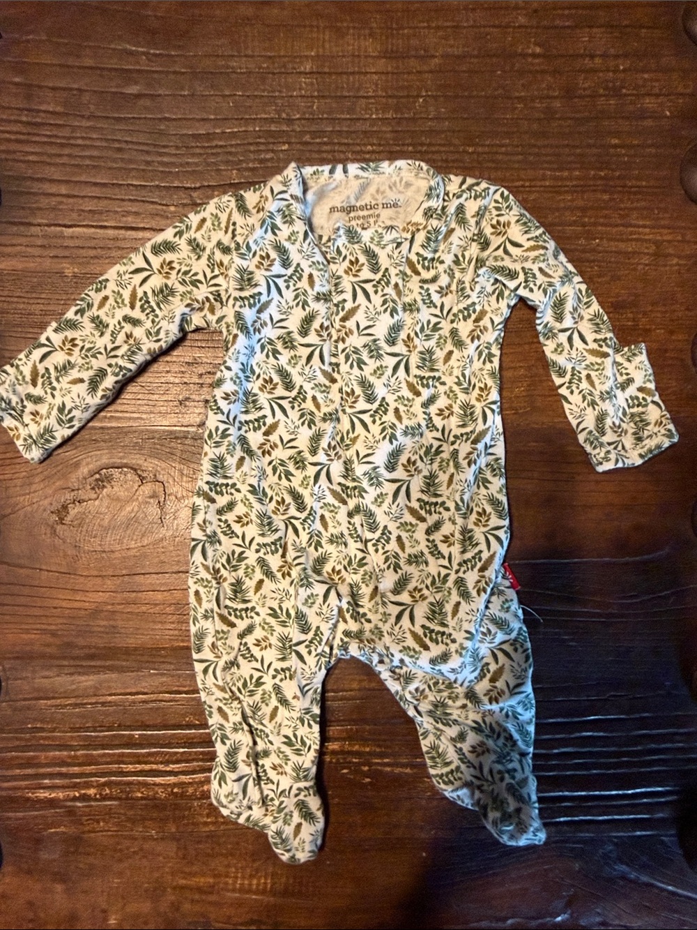 Magnetic Me White Footed One-Piece with Green Leaf Pattern
